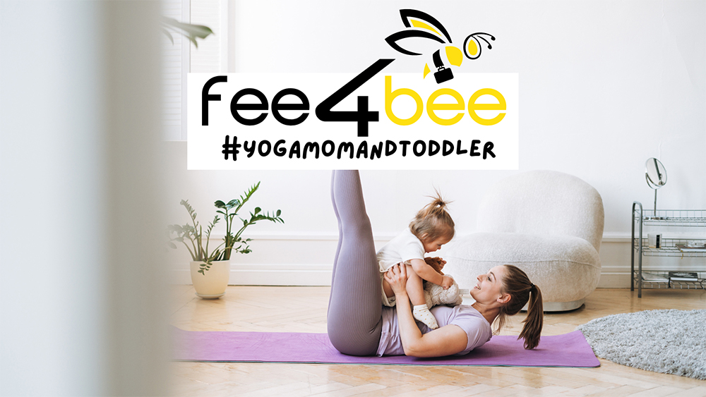 mom and toddler doing yoga together